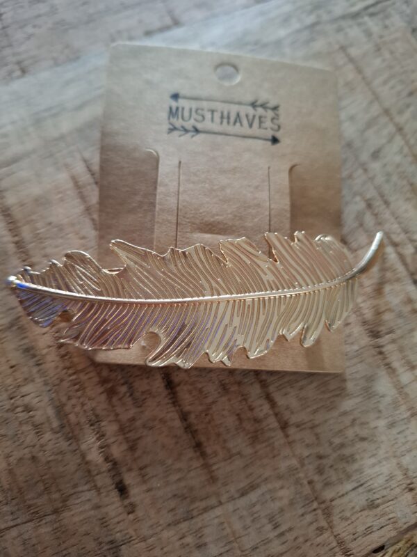 Haar Knip met gouden veer